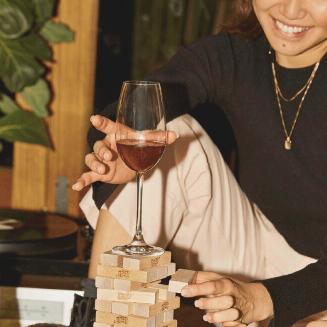 woman holding wine glass
